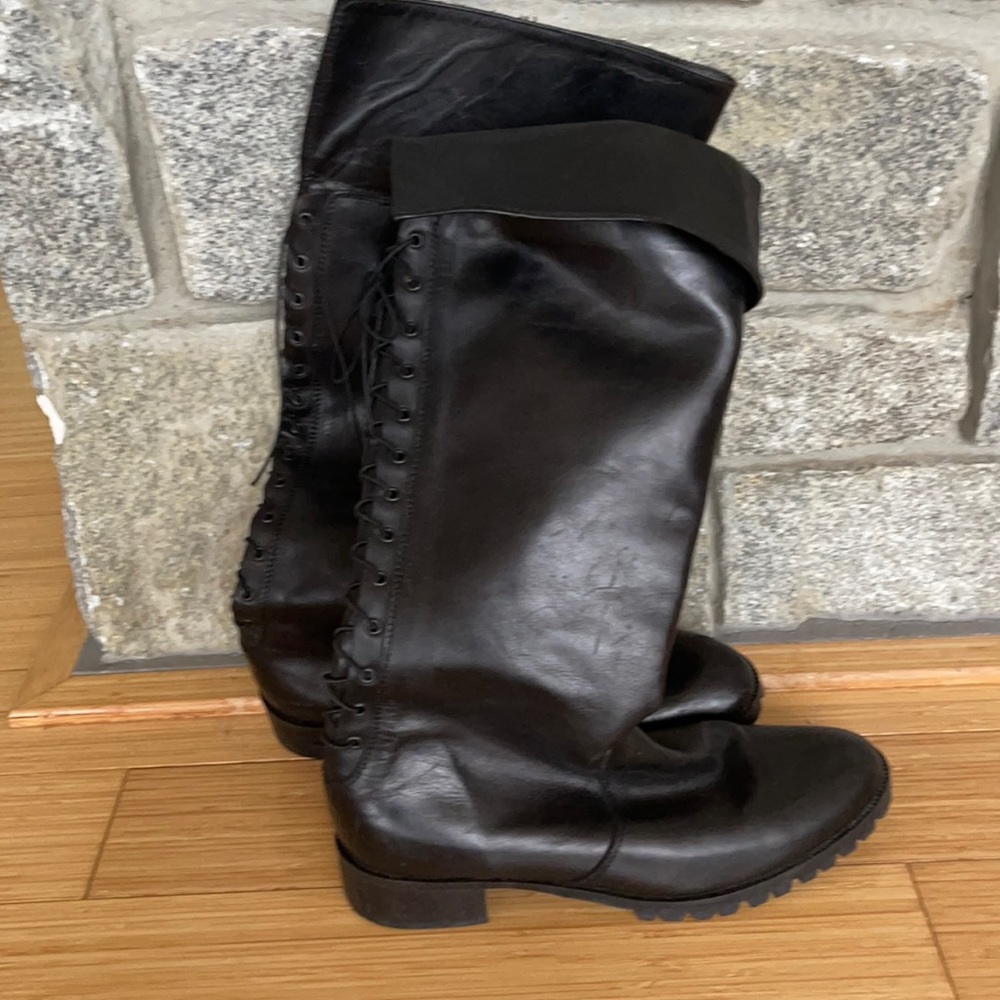 Aquatellia black knee boat. Rubber